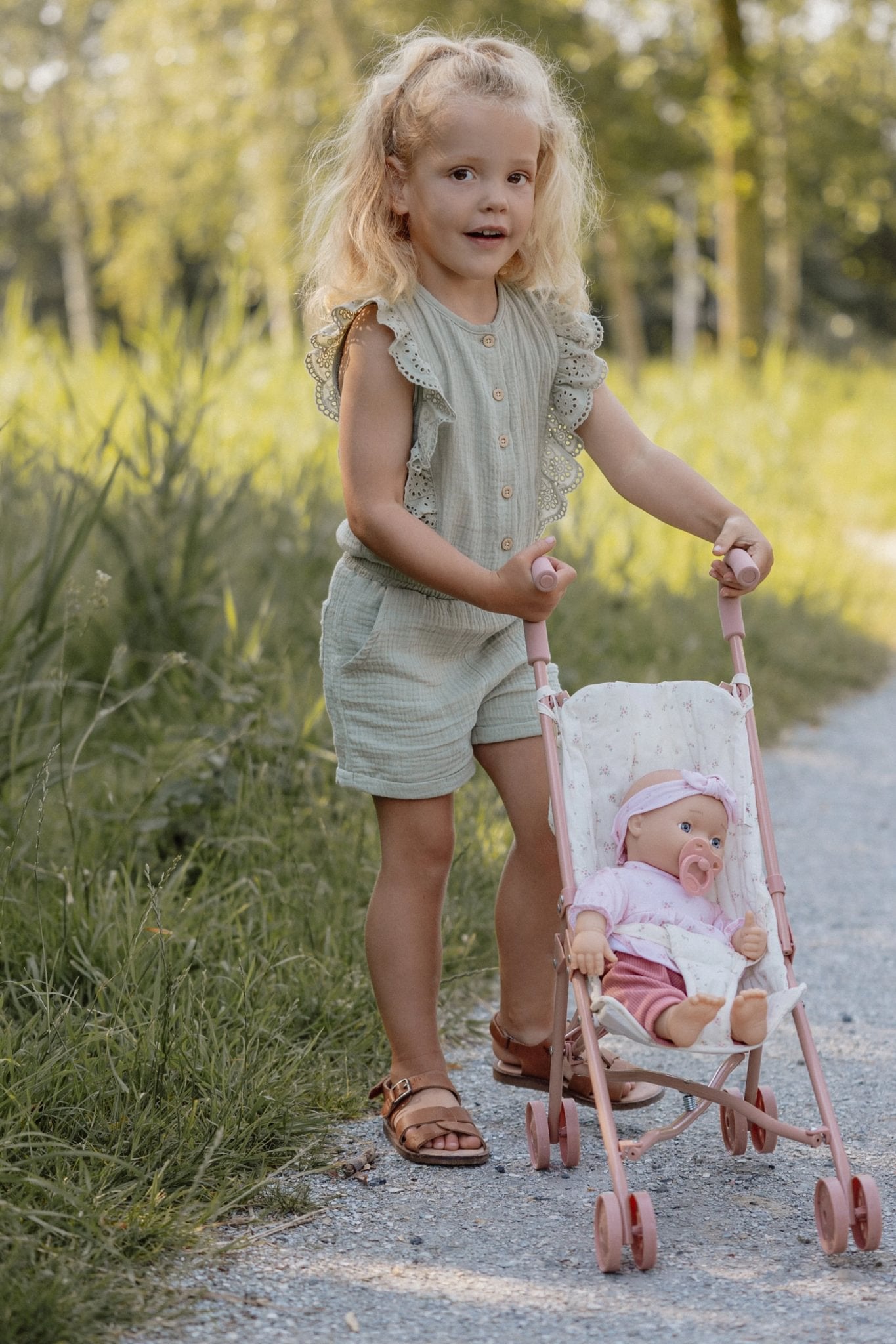 Karrocë kukulle metalike rozë